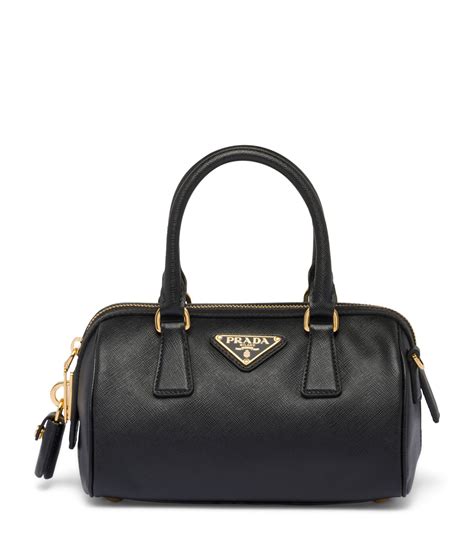 prada black saffiano leather top handle bag|Prada nylon shoulder bag price.